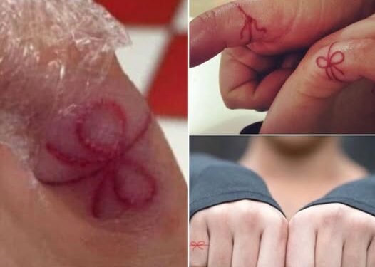 Red string tattoo on hand: Here’s what it means